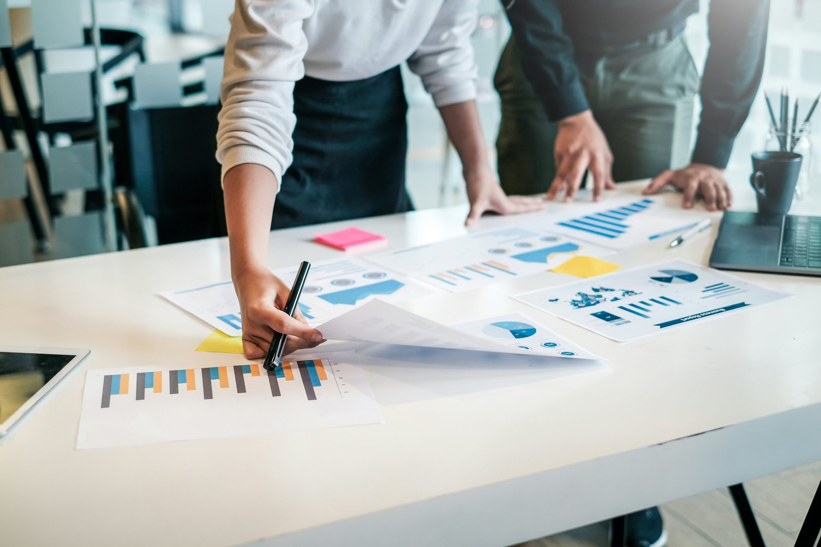Men looking at document for strategy